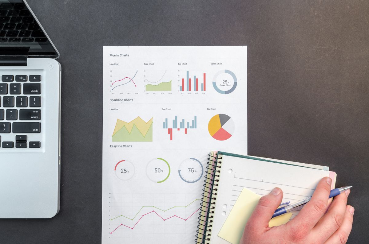 Charts and a notebook on a desk